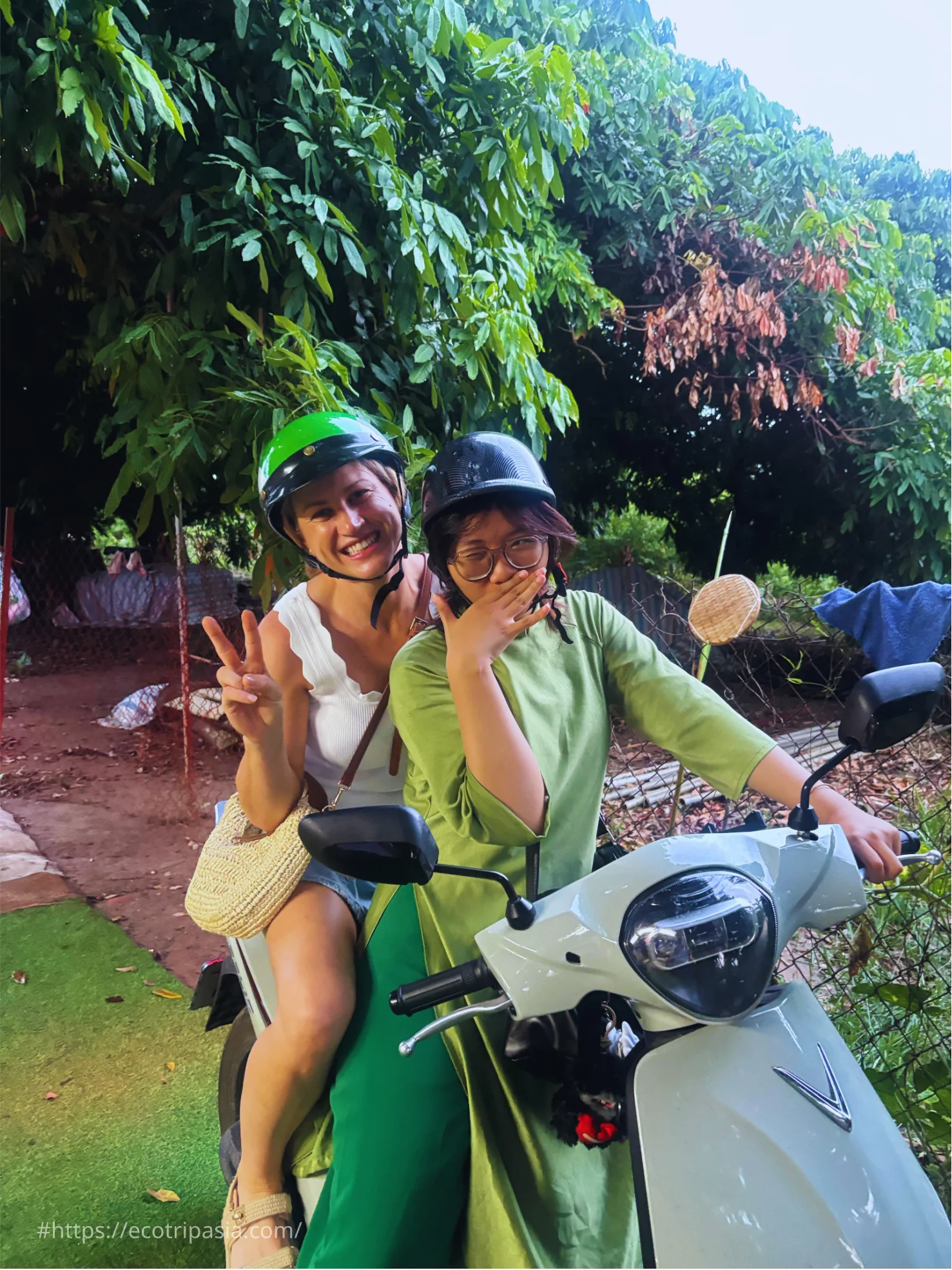 Electric Scooters Riding Along Countryside Paths — hanoi street food tour with female riders by Eco Trip Asia