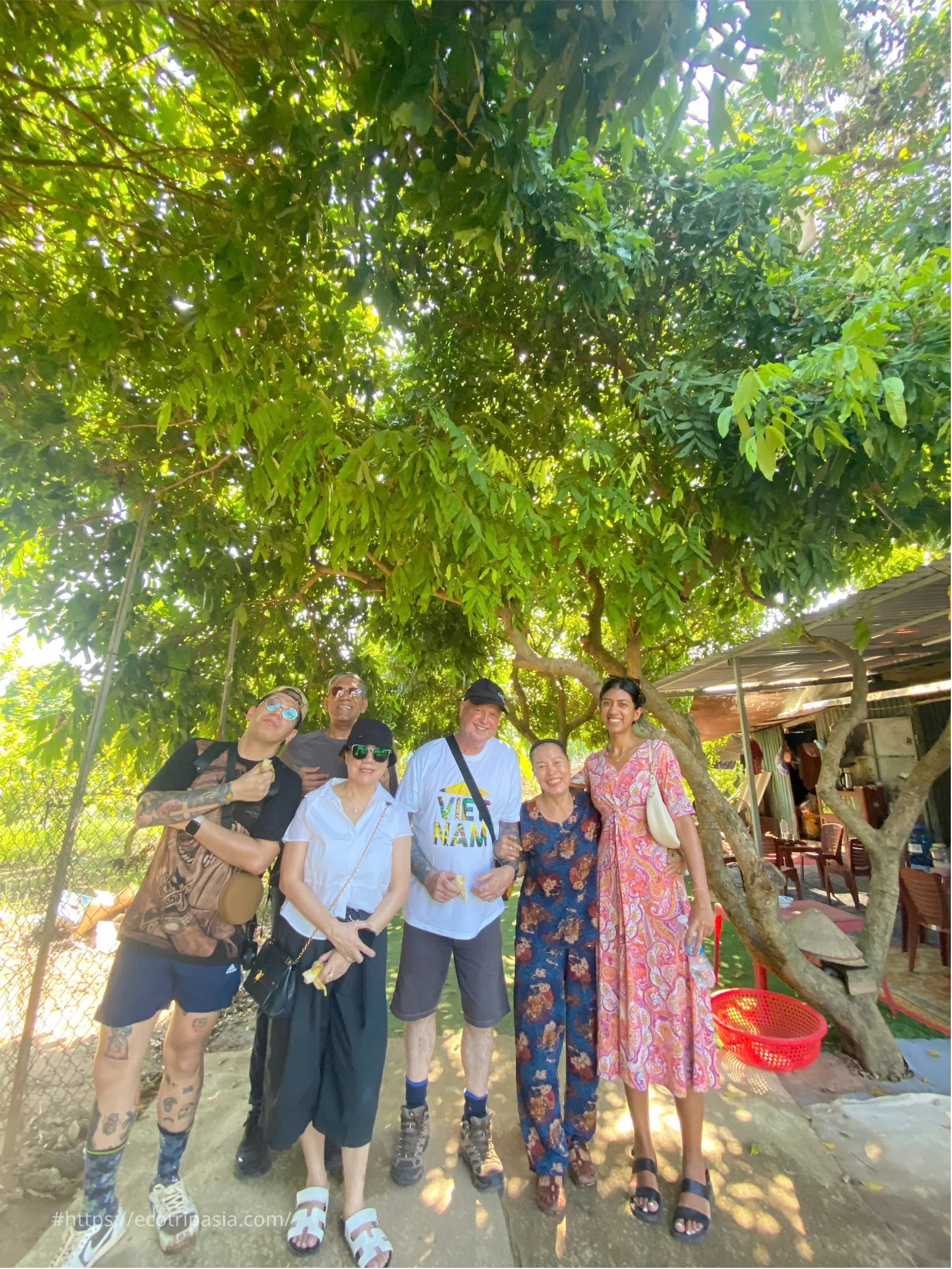 Guests Meeting Local Residents — hanoi street food tour with female riders by Eco Trip Asia